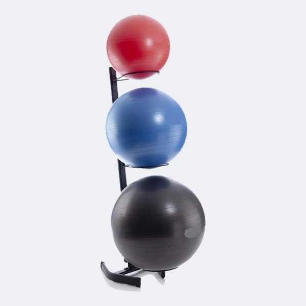Red, blue and black exercise balls arranged on a display rack