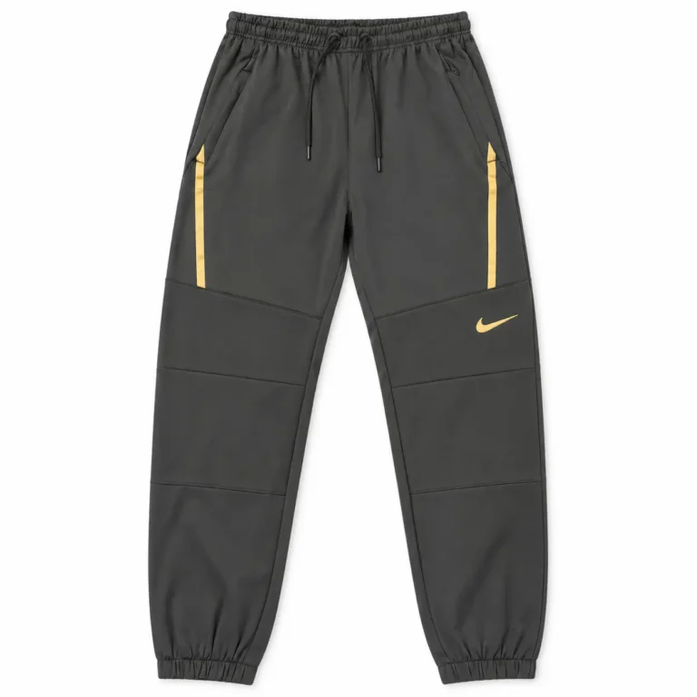 Nike Gold-Trim Cuffed Joggers in Black / Gold – front view